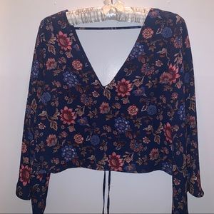 deep v floral blouse.